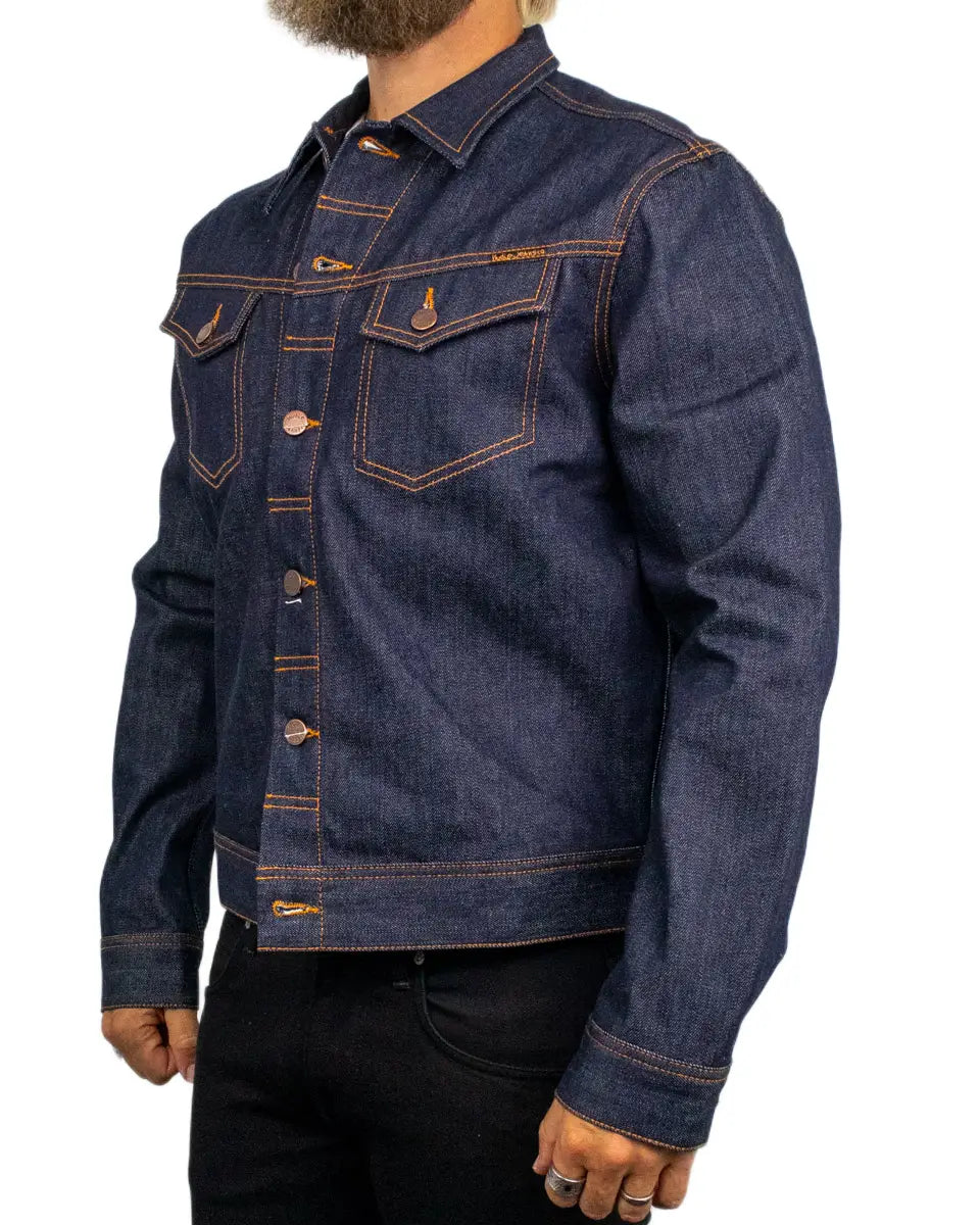 Nudie Conny Denim Jacket Dry One i rå indigo, baksida med brodyr på oket