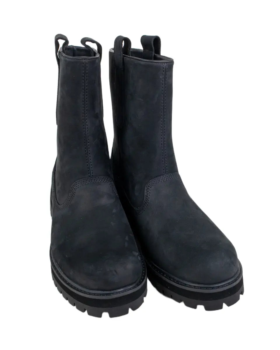 Timberland Heritage Mid Pull On känga i svart, paret snett från sidan