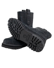 Timberland Heritage Mid Pull On känga i svart, paret med sulan synlig