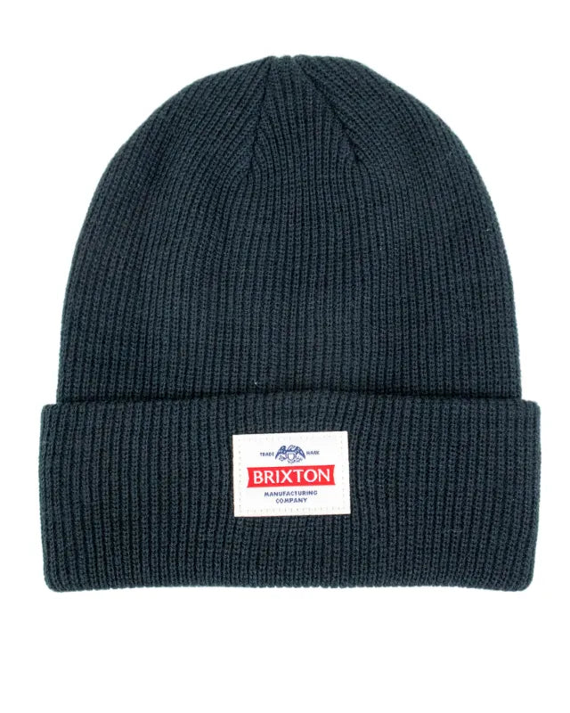 Brixton Trademark Beanie mössa i svart, ribbstickad med uppvikt kant och vävd Brixton-etikett