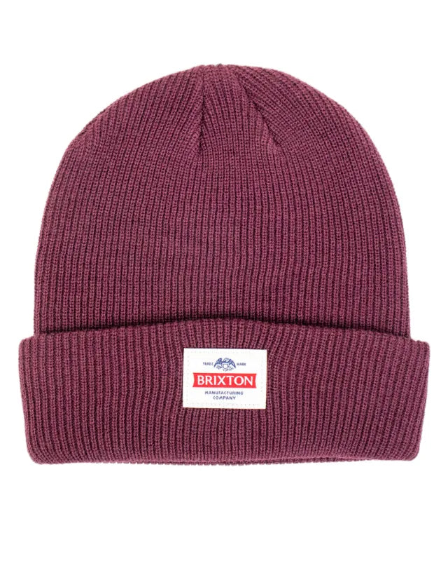 Brixton Trademark Beanie mössa i vinrött med uppvikt kant och vävd etikett