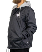 Vans Torrey Hooded Coaches Jacket i svart, från sidan