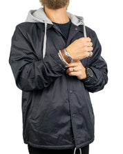Vans Torrey Hooded Coaches Jacket i svart, framsida